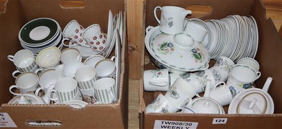 A large quantity of Susie Cooper tableware, including Nasturtium, Marigold, Wild Strawberry, Bridal Bouquet, etc.